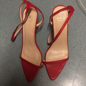 Red misguided heels